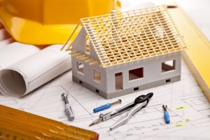 Где и как приобрести строительные материалы для возведения загородного дома?